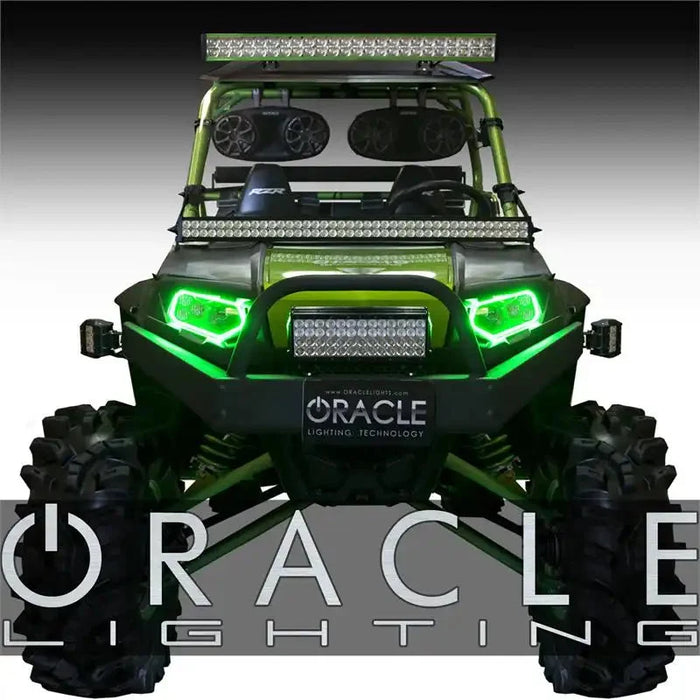 Front view of a Polaris RZR with green headlight halos installed.