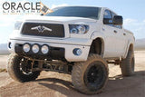 Three quarters view of a Toyota Tundra with white LED headlight halo rings installed.