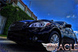 Low aggressive shot of an Infiniti M37 with white LED headlight halo rings installed.