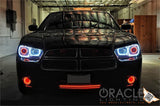 Front end of a Dodge Charger with white LED headlight halo rings installed.