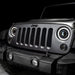 Front end of a Jeep Wrangler JK with 7" Oculus Headlights installed.