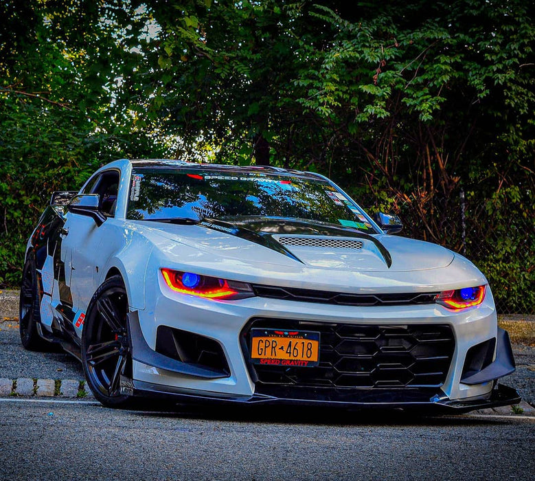 Chevrolet Camaro with blue demon eye projector headlights.