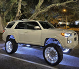 White toyota with white LED wheel rings.