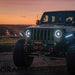Front end of a Jeep Wrangler JL with Oculus Headlights installed.