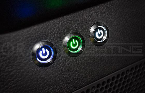 Three power symbol switches installed side by side.