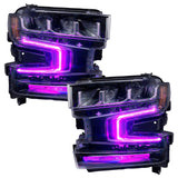 Chevrolet Silverado 1500 headlights with purple DRLs.