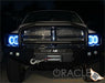Front end of a Dodge Ram with white LED headlight halo rings installed.