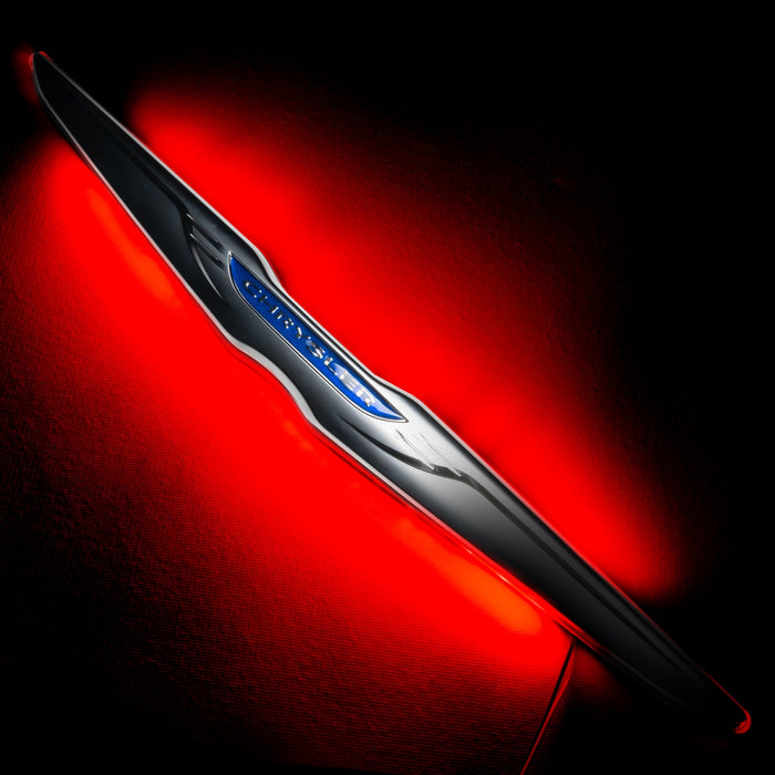 Gen II Chrysler Illuminated LED Rear Wing Emblem with red LEDs.