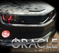 Front end of a Chevrolet Corvette with red LED headlight and fog light halo rings installed.