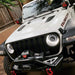 Front end of a Jeep with Oculus Headlights installed.