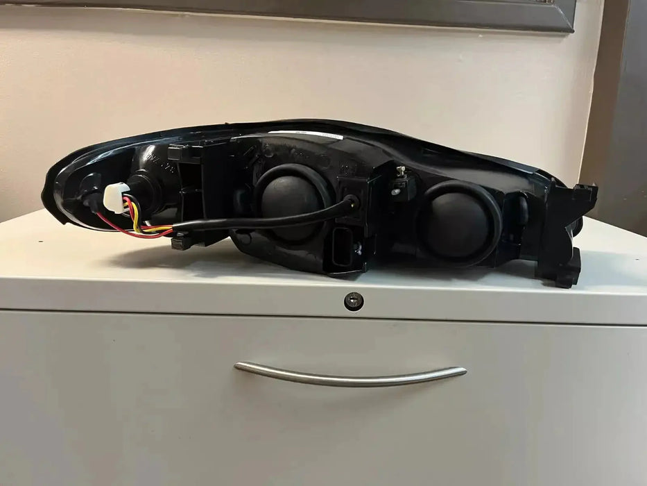 NEW Eagle Eye 2000-2005 Chevy Monte Carlo Driver side head light- GM220-B001L