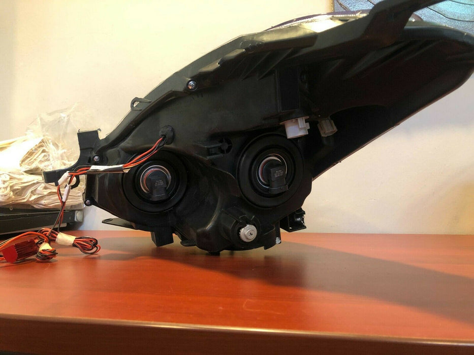 Rear view of Used 2010-2012 Nissan Altima Coupe White LED Headlights - Clearance