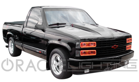 Three quarters view of a Chevrolet Blazer with red LED headlight halos installed.
