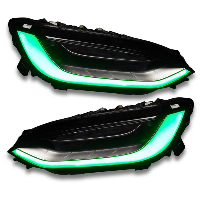 Tesla model X headlights with green DRL