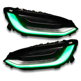 Tesla model X headlights with green DRL