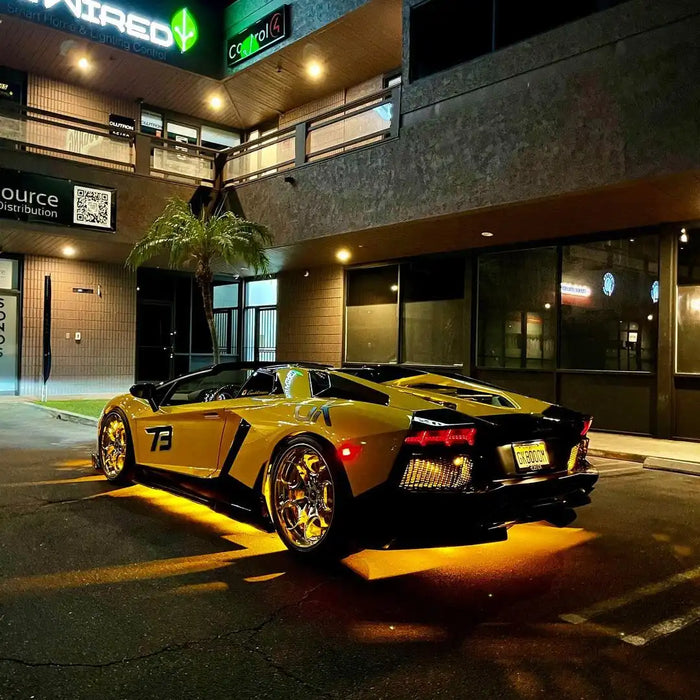 Yellow Lamborghini with yellow LED underbody kit installed.