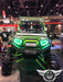 Polaris RZR in a showroom, equipped with green LED headlight halos.