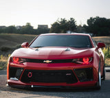 Red camaro outdoors with red projector halos