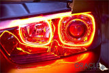 Close-up of charger headlights with amber halos
