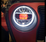 Close-up of red demon eye installed on jeep