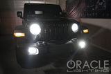 Jeep in a garage with bright LED headlights