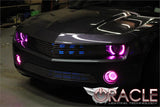 Close up on camaro grill with pink halo headlights and fog lights