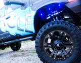 Close-up of wheel well with blue LED rock lights
